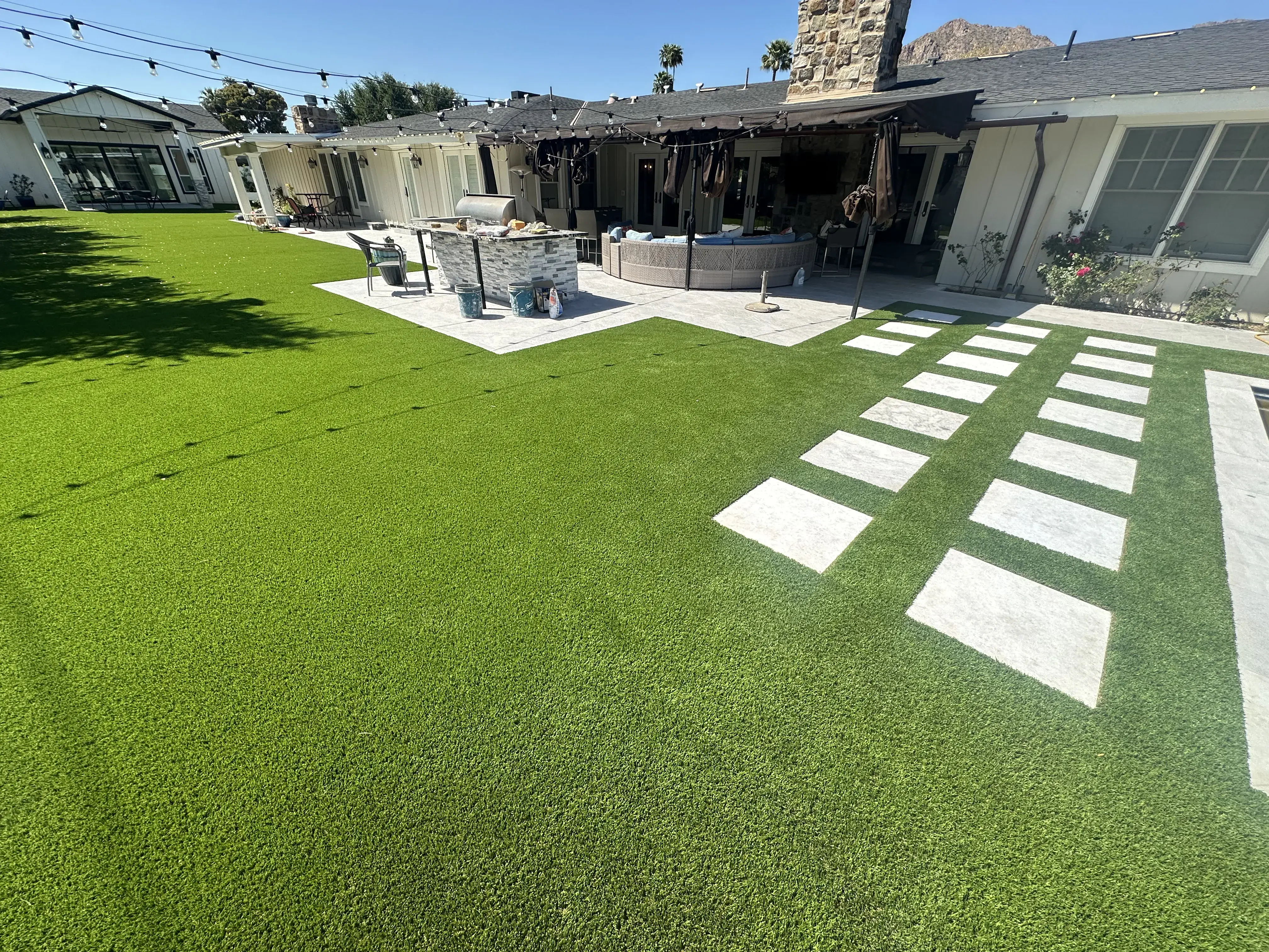 After: New landscaping and decorative rock installation