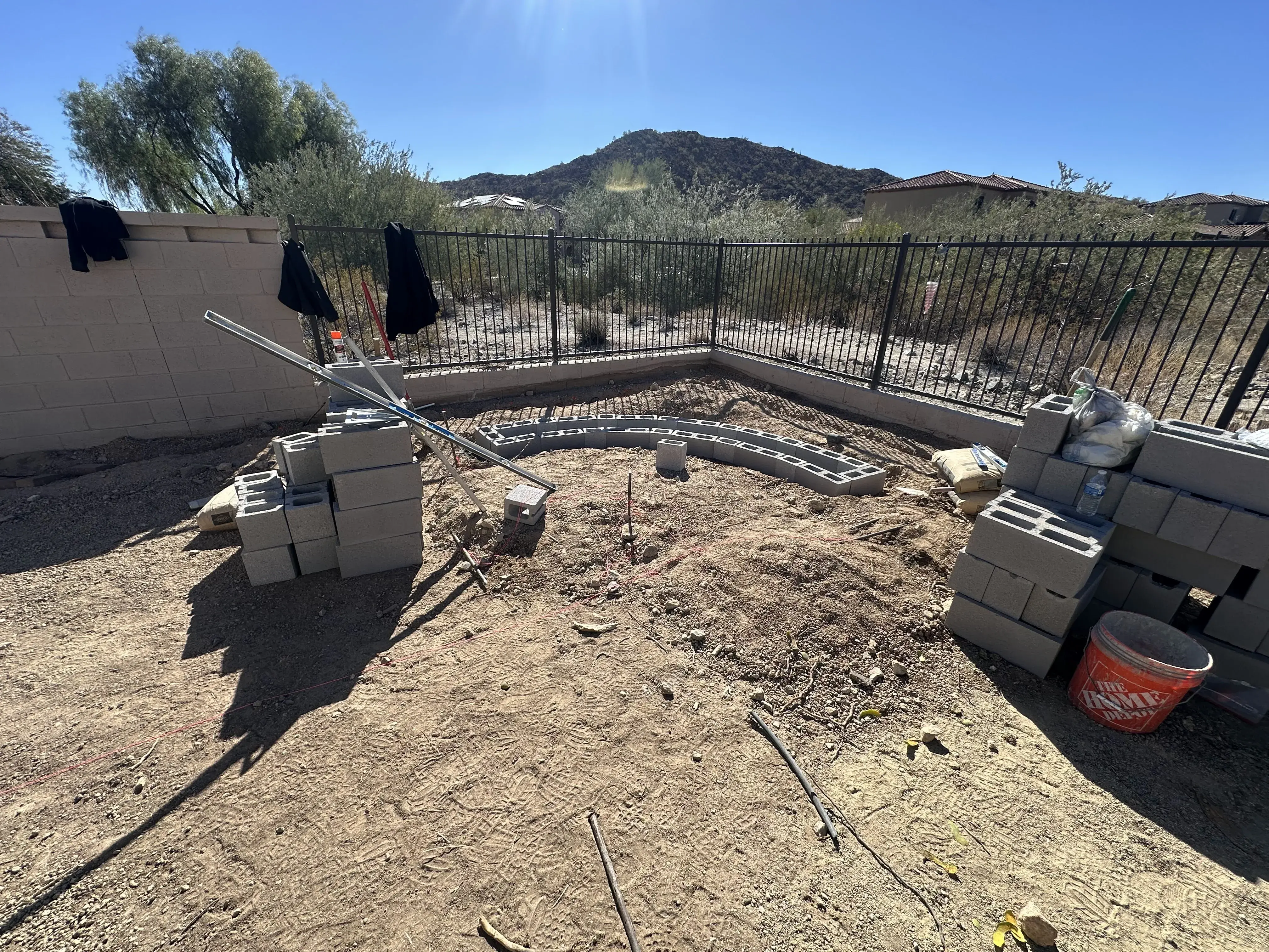 Before: Backyard transformation with artificial grass and extended paver patio