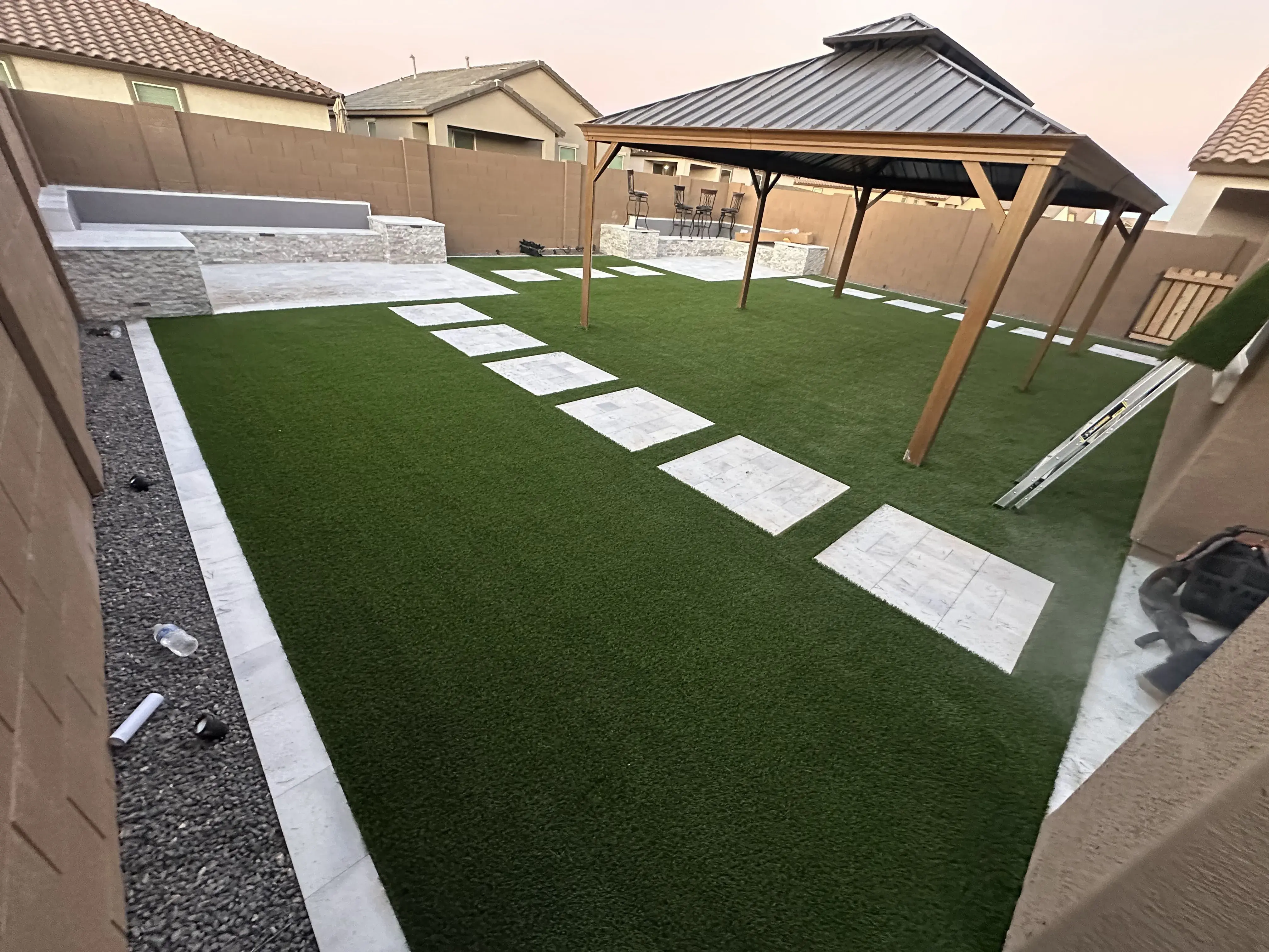 After: Backyard renovation with native plants and paver patio