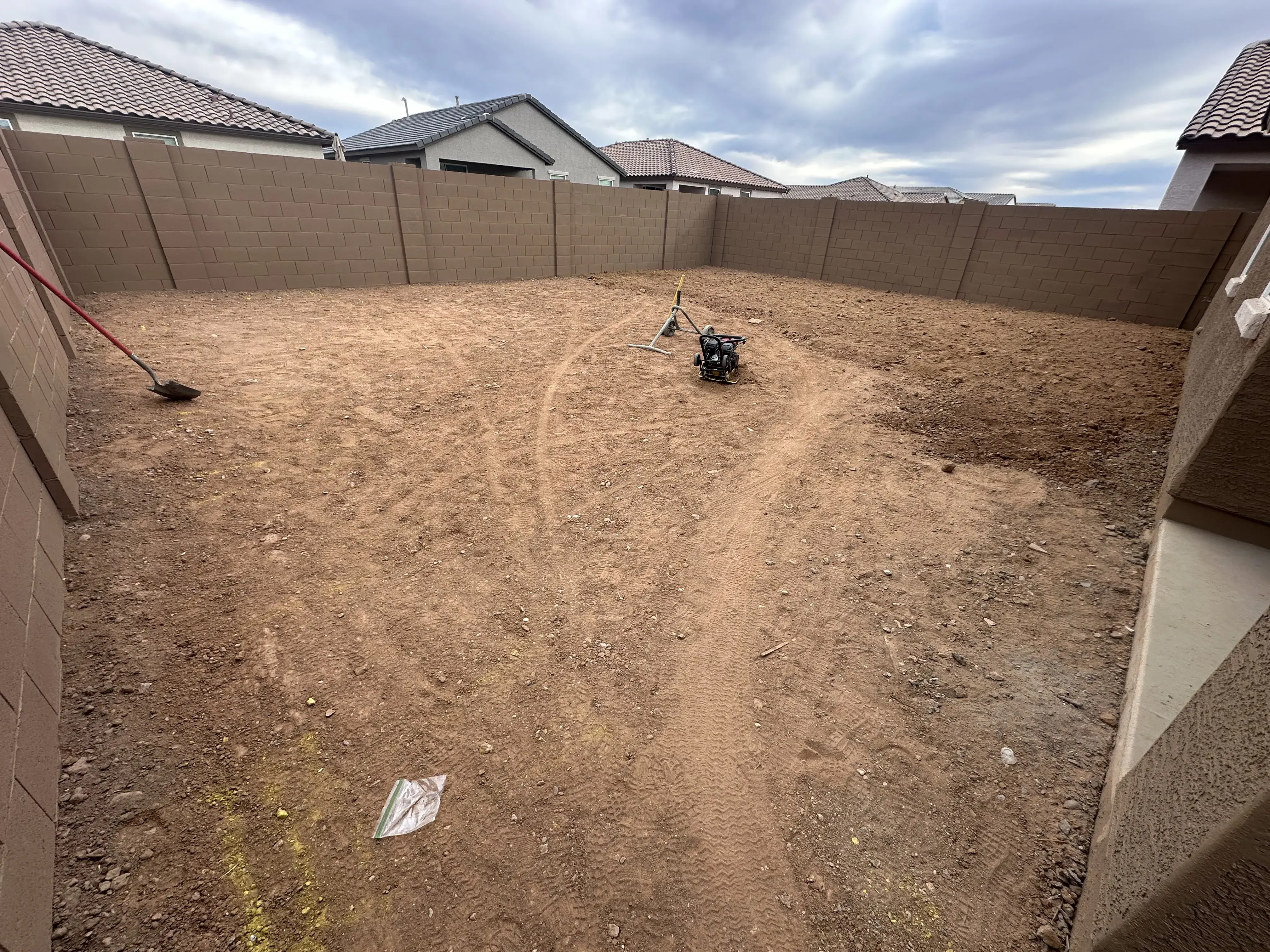 Before: Backyard renovation with native plants and paver patio